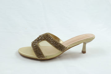 gold H heels