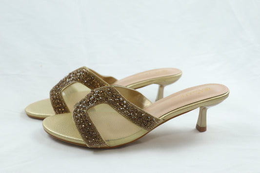 gold H heels